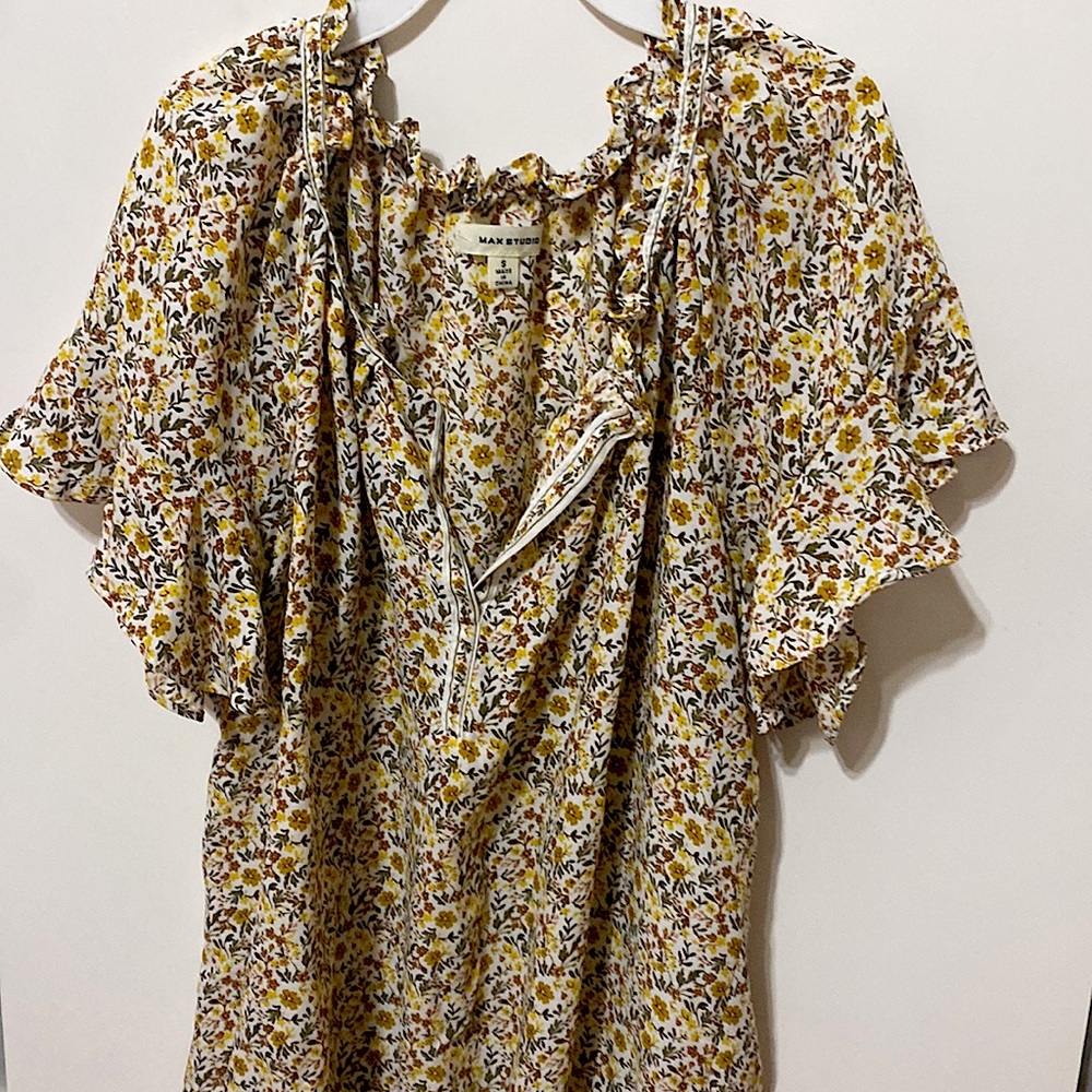 Formal blouse top with low V cut.